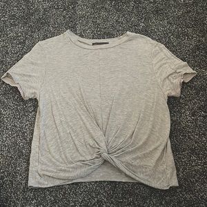 Gray T-shirt. Brand is West Coast Love. Size L. Runs small.